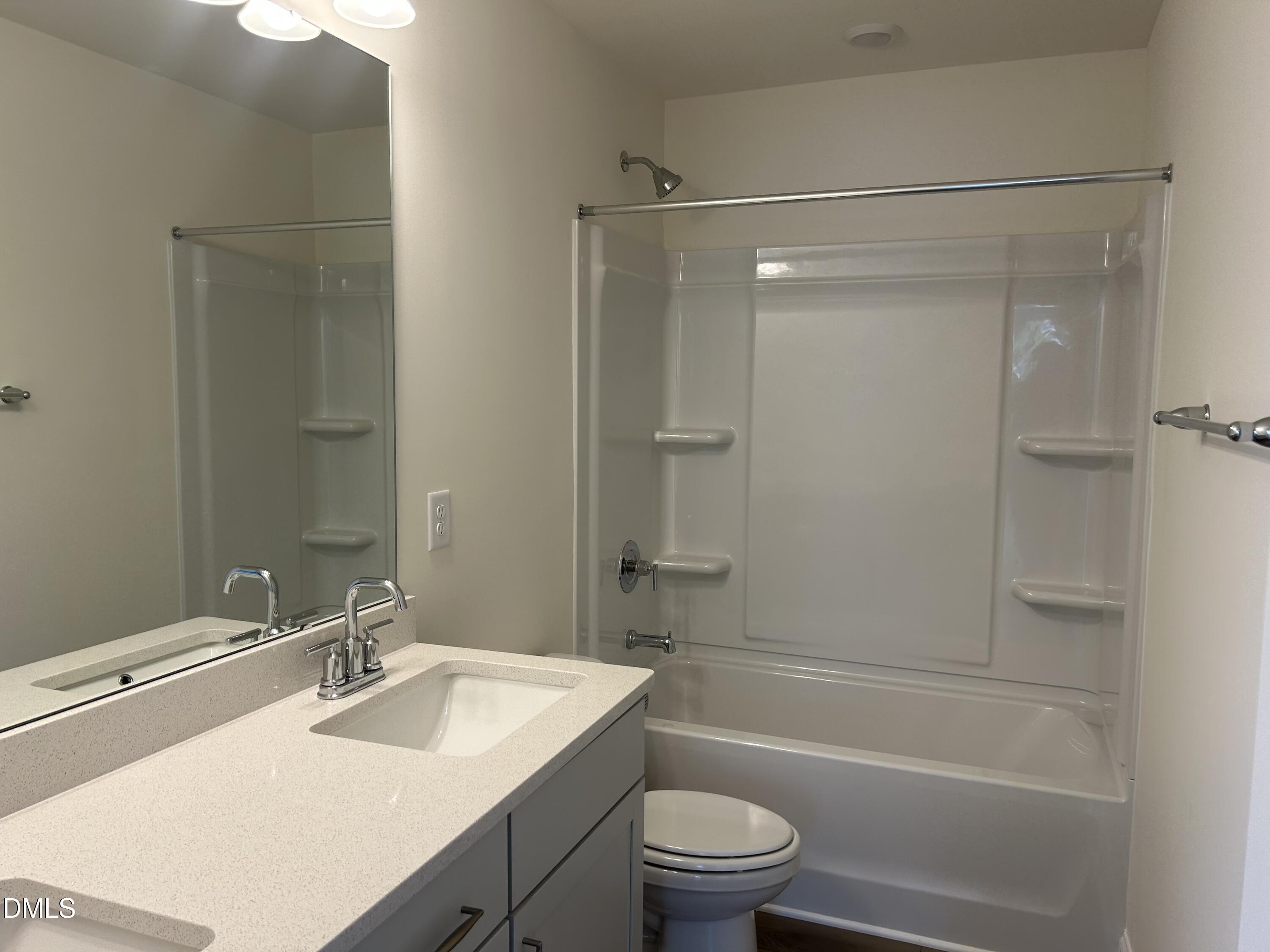 2023 Seneca Road Raleigh, NC 27604 - Photo 10 of 18 a bathroom with a sink toilet and shower