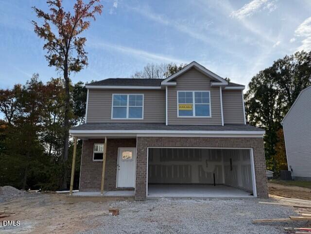 2023 Seneca Road Raleigh, NC 27604 - Photo 12 of 40 a front view of a house with plants and trees