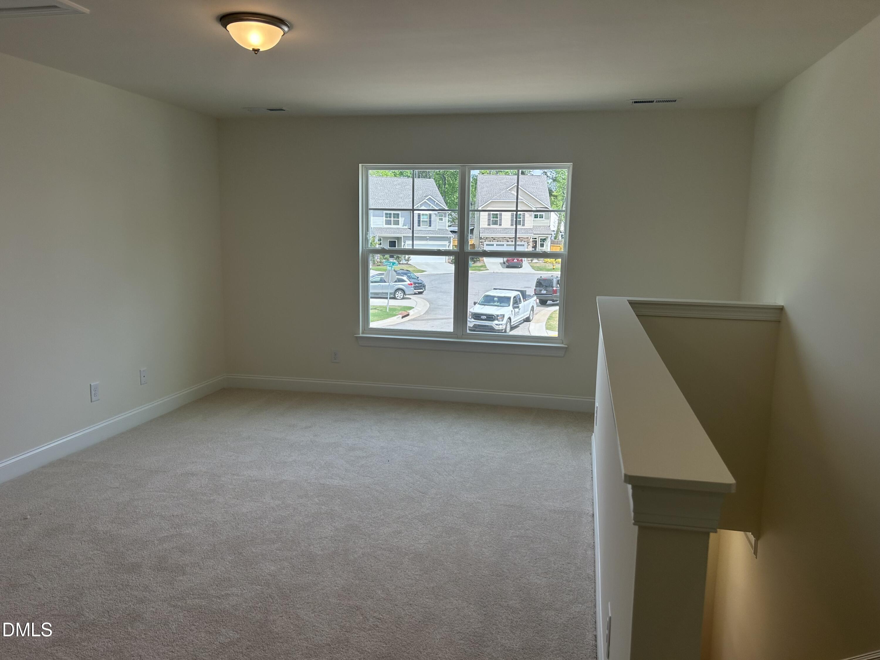 2023 Seneca Road Raleigh, NC 27604 - Photo 7 of 18 an empty room with a window