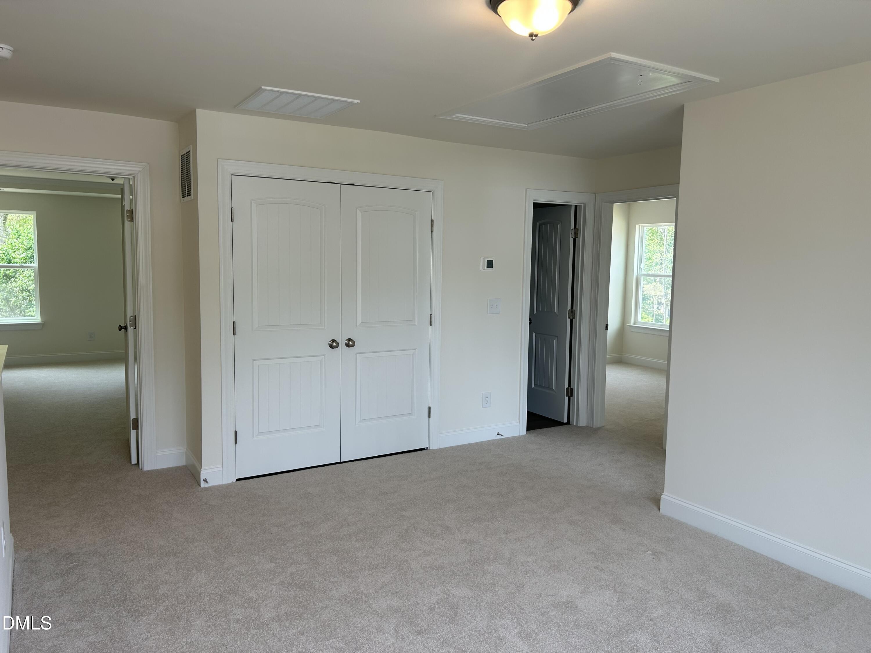 2023 Seneca Road Raleigh, NC 27604 - Photo 8 of 18 an empty room with windows and closet