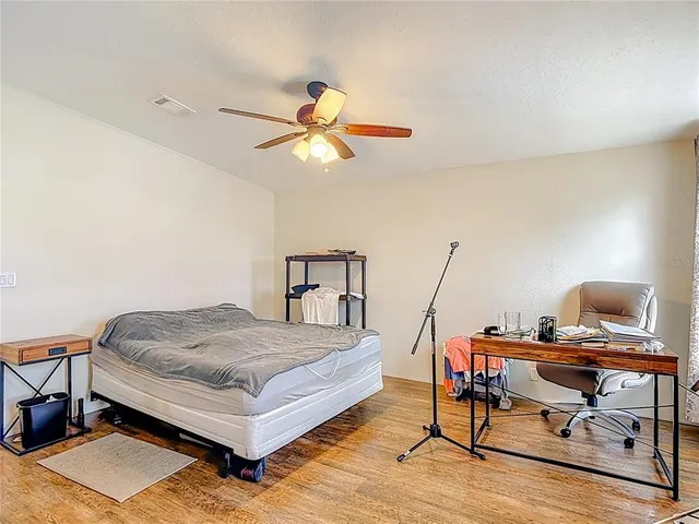 a bathroom with a sink vanity and a mirror