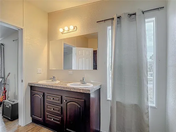 a view of outdoor space with green field and trees