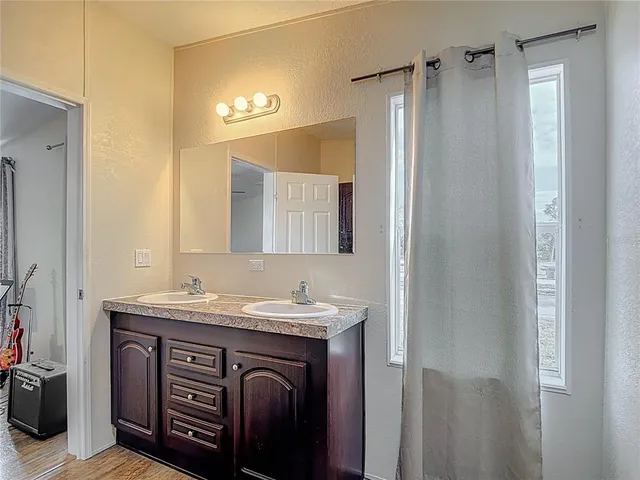 a view of a backyard with sitting area and furniture