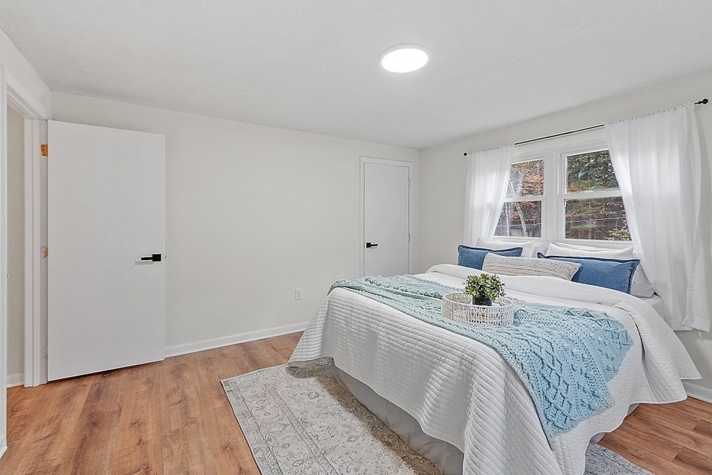 663 Sterling Road Lancaster, MA 01523 - Photo 25 of 33 a bedroom with a bed and window