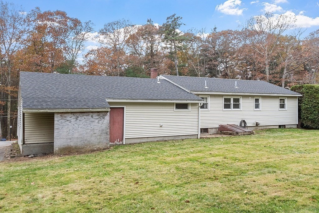 663 Sterling Road Lancaster, MA 01523 - Photo 33 of 33 front view of a house with a yard