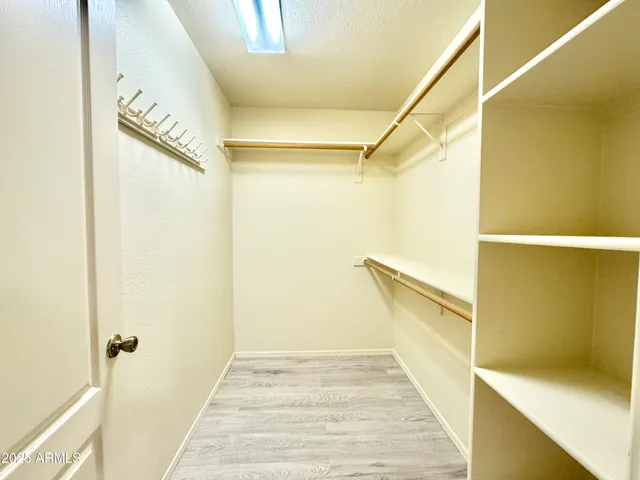 a bathroom with a shower and a tub