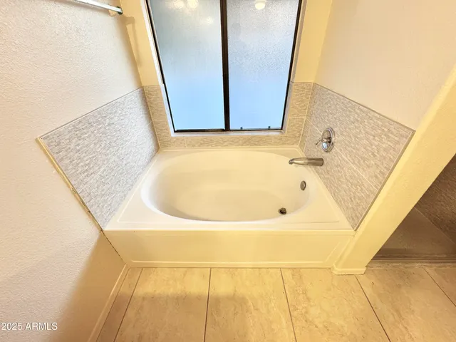 a bathroom with a bathtub