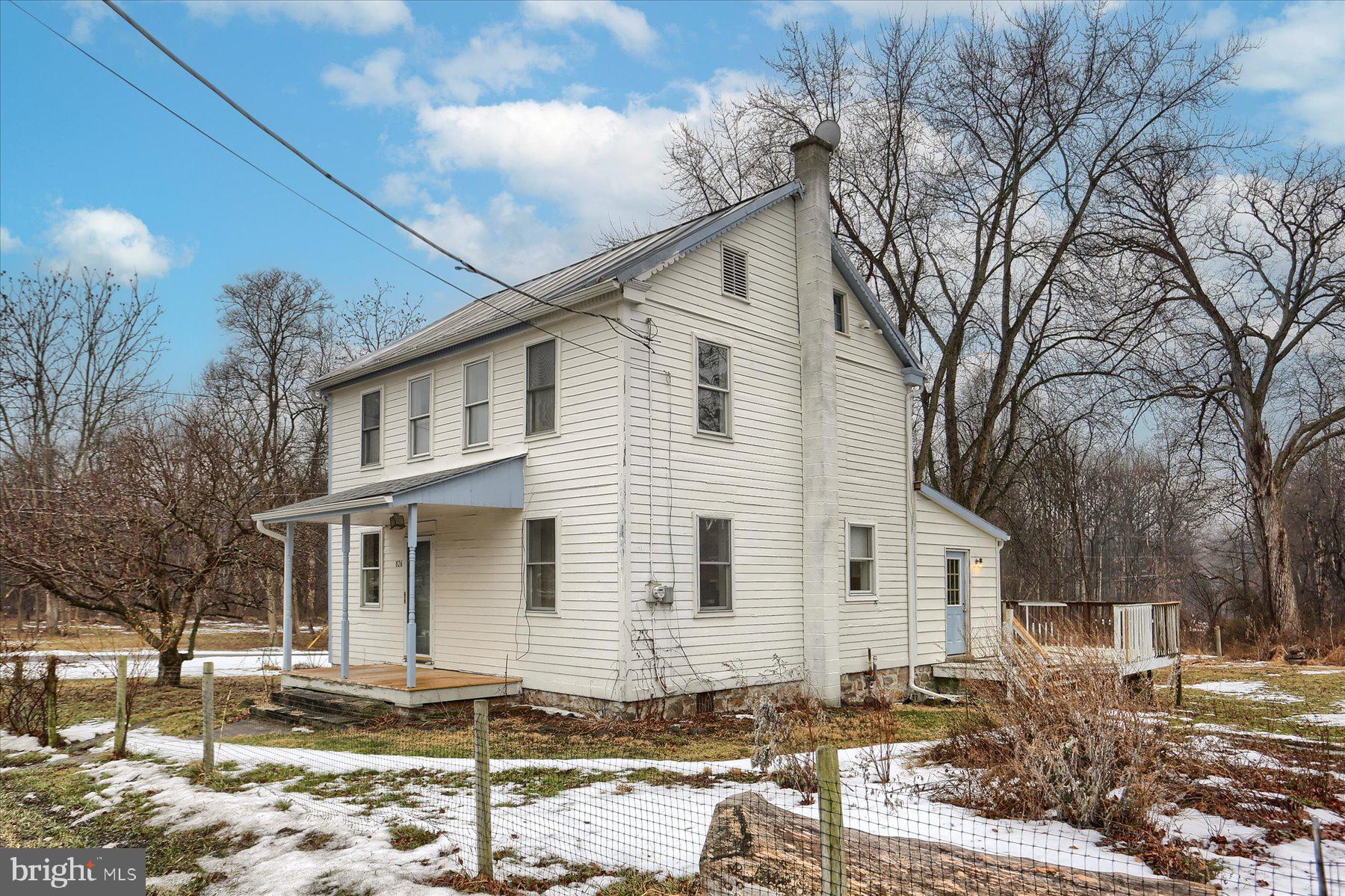 826 Pinetown Road Lewisberry, PA 17339 - Photo 2 of 31 a front view of a house with a yard