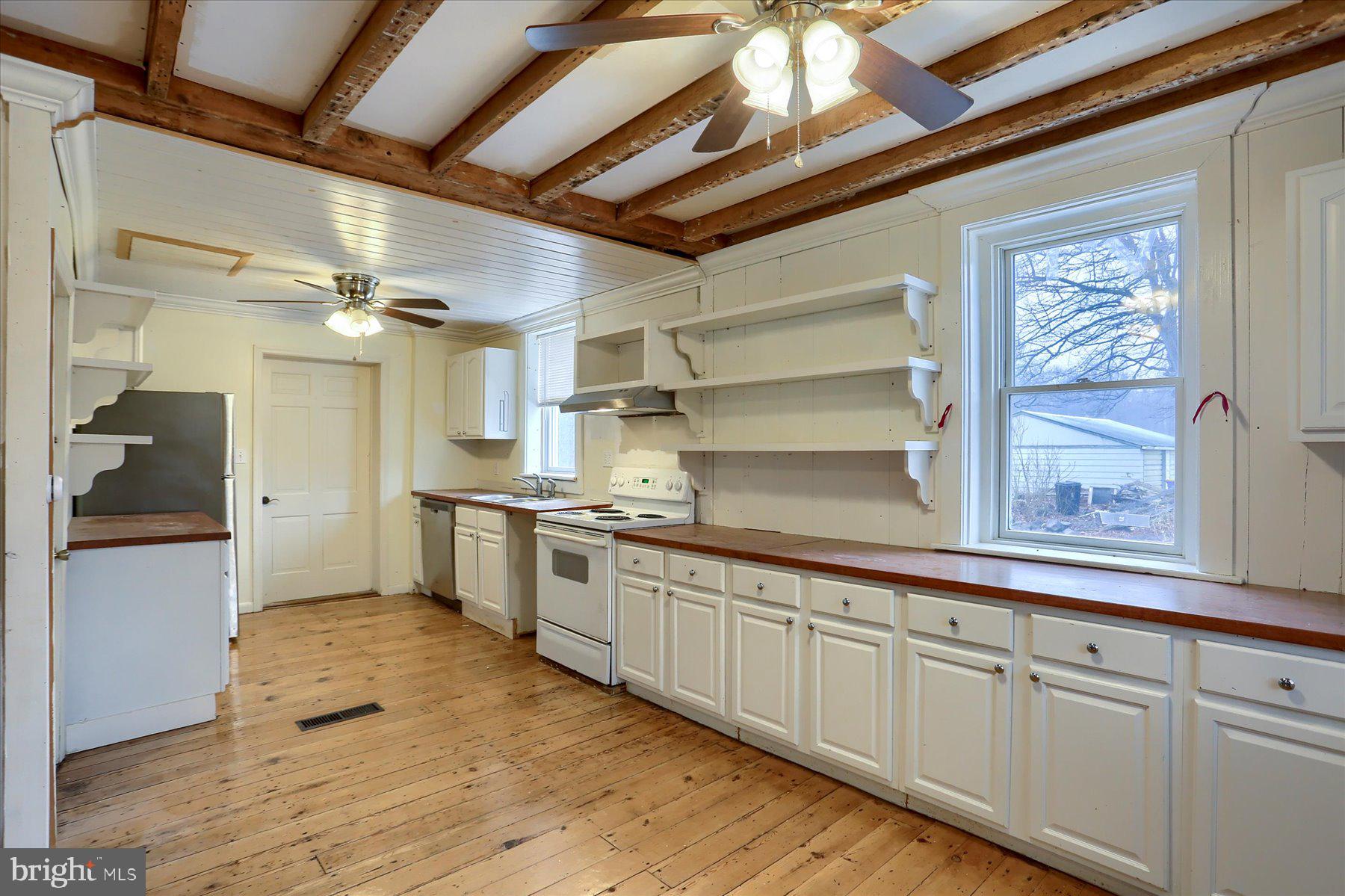 826 Pinetown Road Lewisberry, PA 17339 - Photo 6 of 31 a kitchen with white cabinets and sink