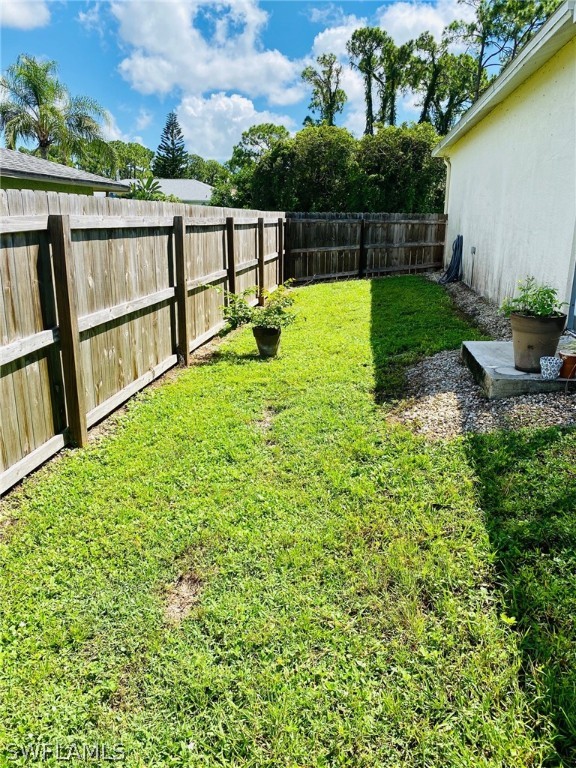 18566 Violet Road Fort Myers, FL 33967 - Photo 30 of 30 a view of backyard with swimming pool