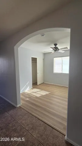 a view of an empty room and window