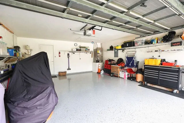 an aerial view of a house with a garden