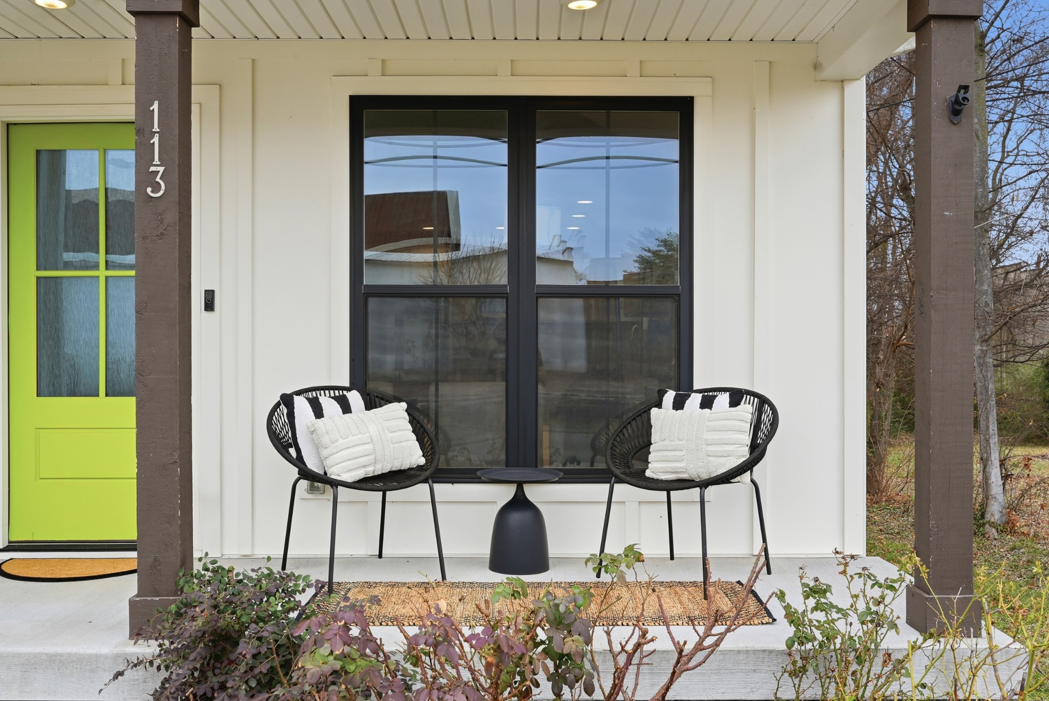 113 11th Avenue West Springfield, TN 37172 - Photo 21 of 27 a couple of chairs sitting in front of a door