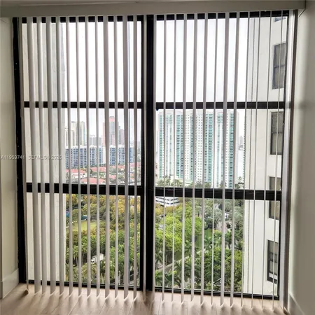 a view of a city with tall buildings