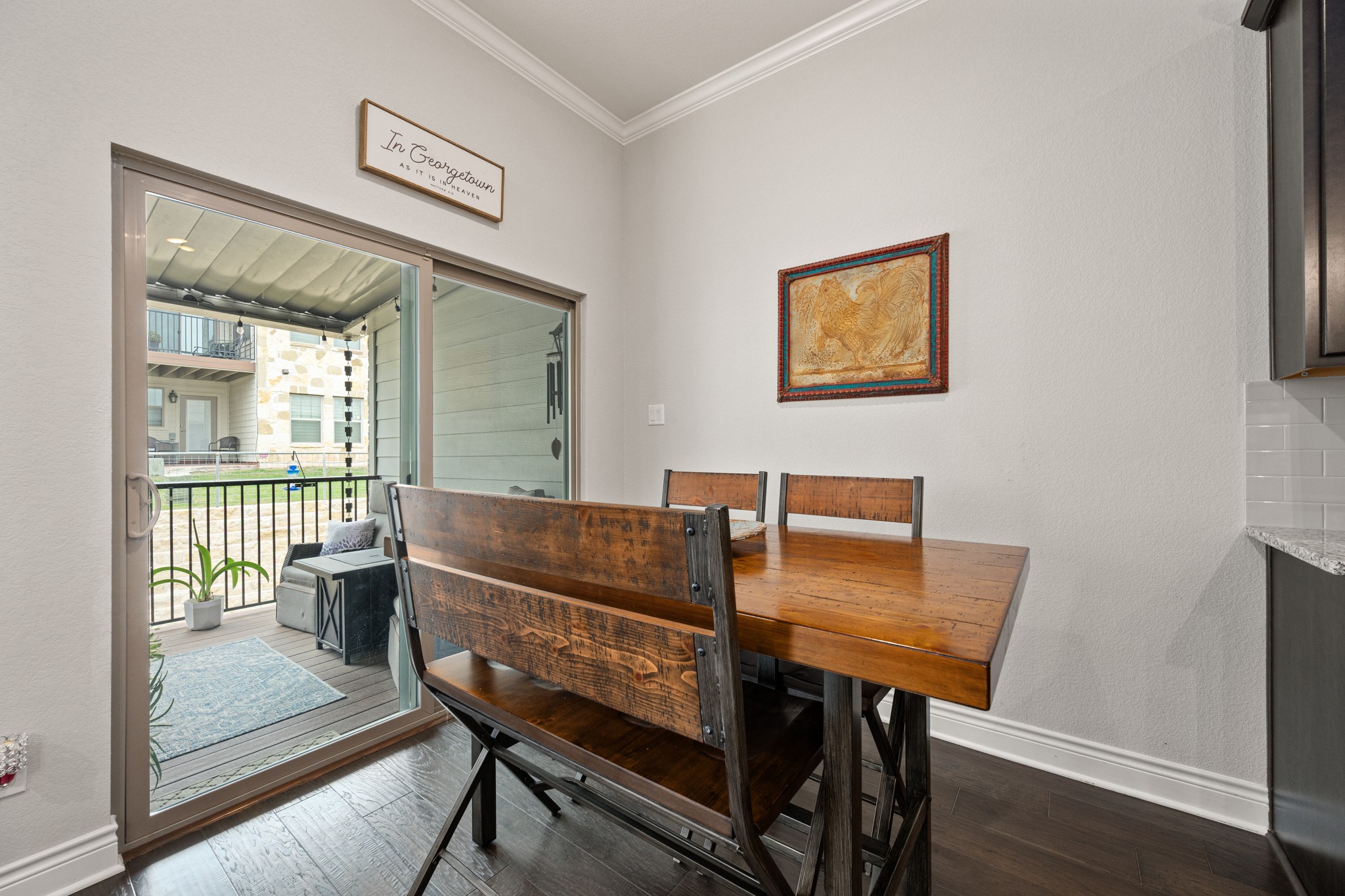 372 Adams Street Georgetown, TX 78628 - Photo 14 of 33 Glass door leading to a private patio