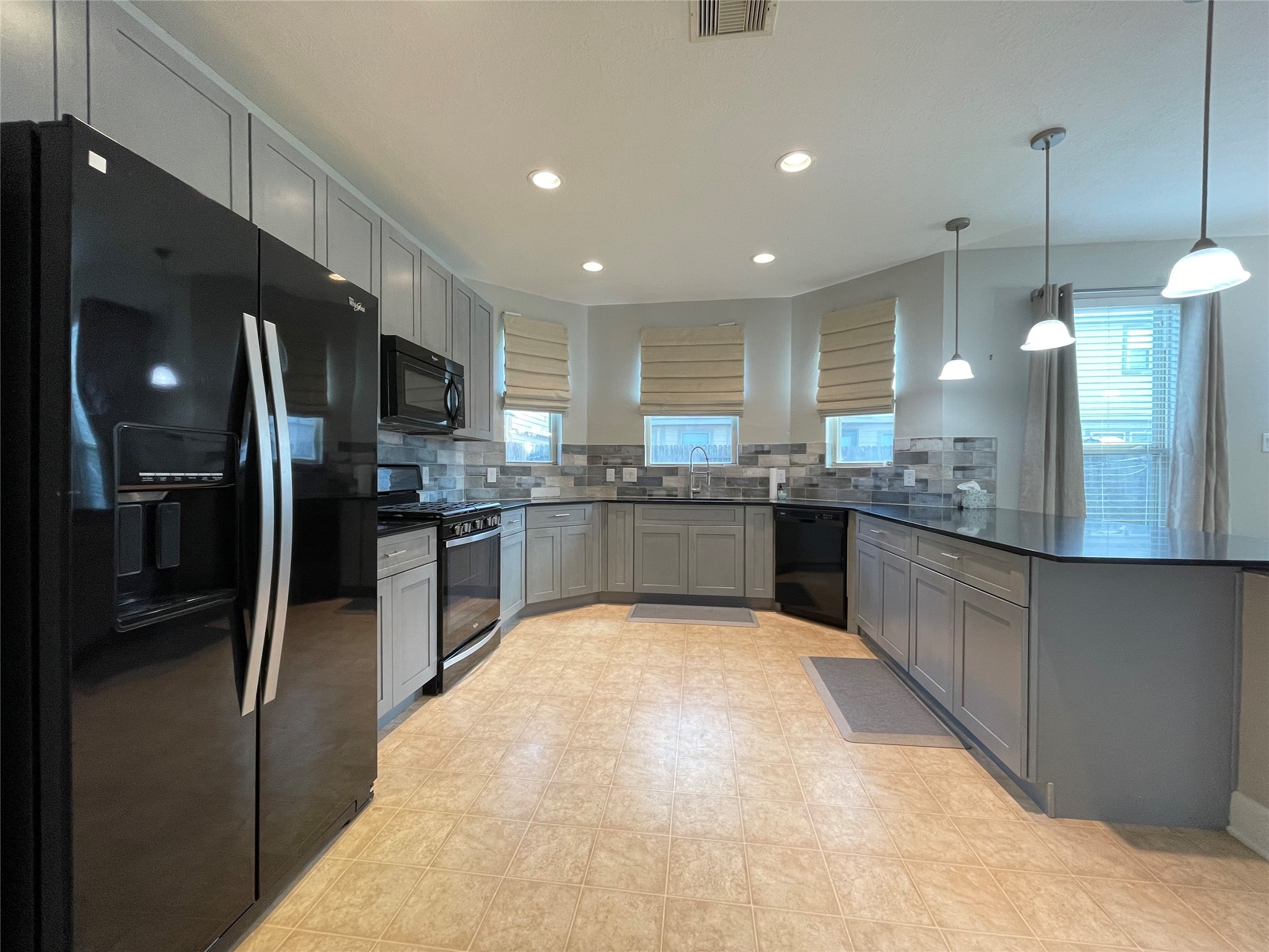 2707 Volute Houston, TX 77038 - Photo 7 of 28 Custom remote operated window coverings!