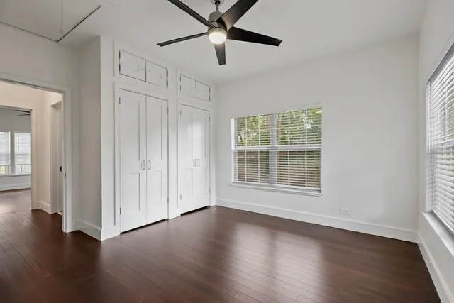 a bathroom with a sink toilet a mirror and shower