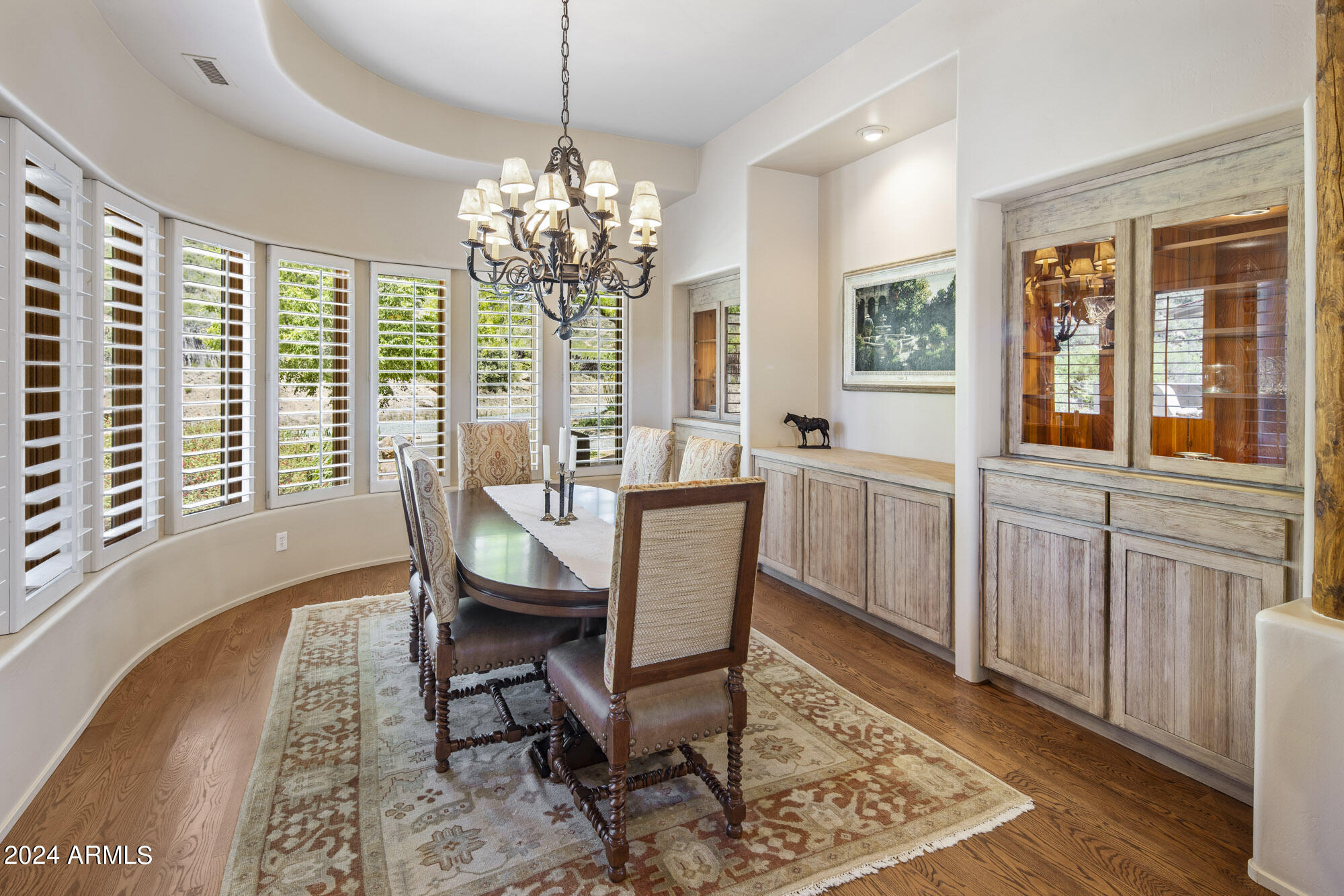 5500 Four Cross Ranch Road Skull Valley, AZ 86338 - Photo 16 of 59 a view of a dining room with furniture window and wooden floor