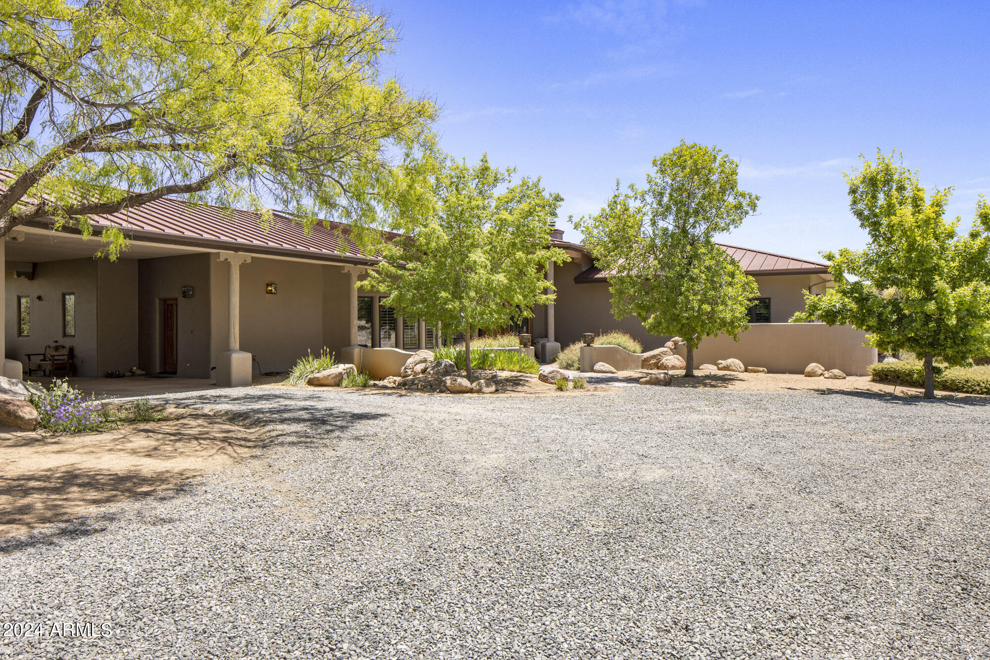 5500 Four Cross Ranch Road Skull Valley, AZ 86338 - Photo 32 of 59 a view of a house with a yard and garage