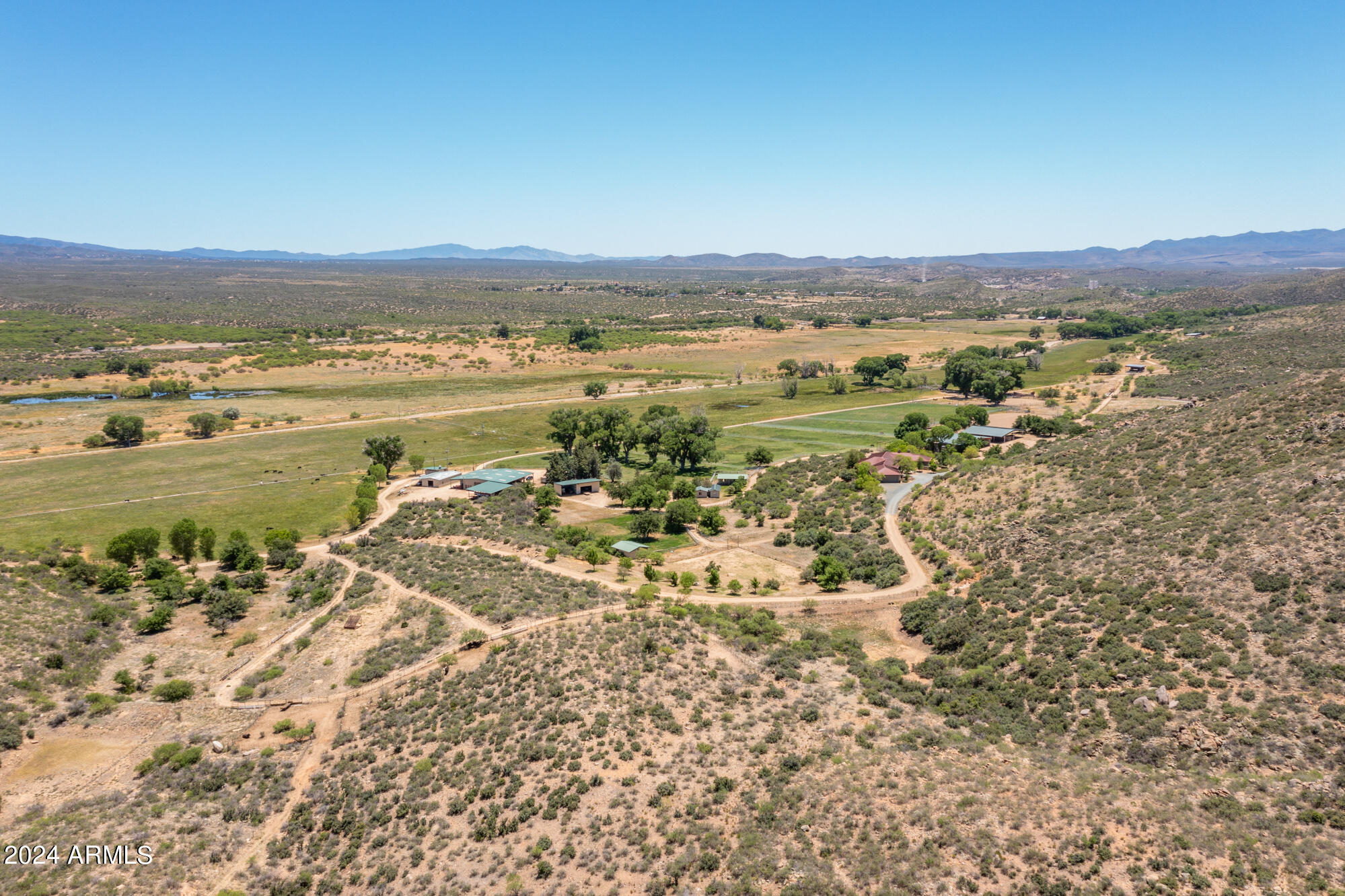 5500 Four Cross Ranch Road Skull Valley, AZ 86338 - Photo 4 of 59 a view of an ocean and a mountain