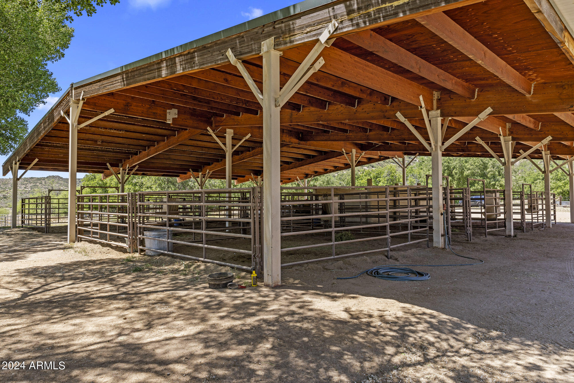 5500 Four Cross Ranch Road Skull Valley, AZ 86338 - Photo 44 of 59 a view of a wooden deck with a backyard