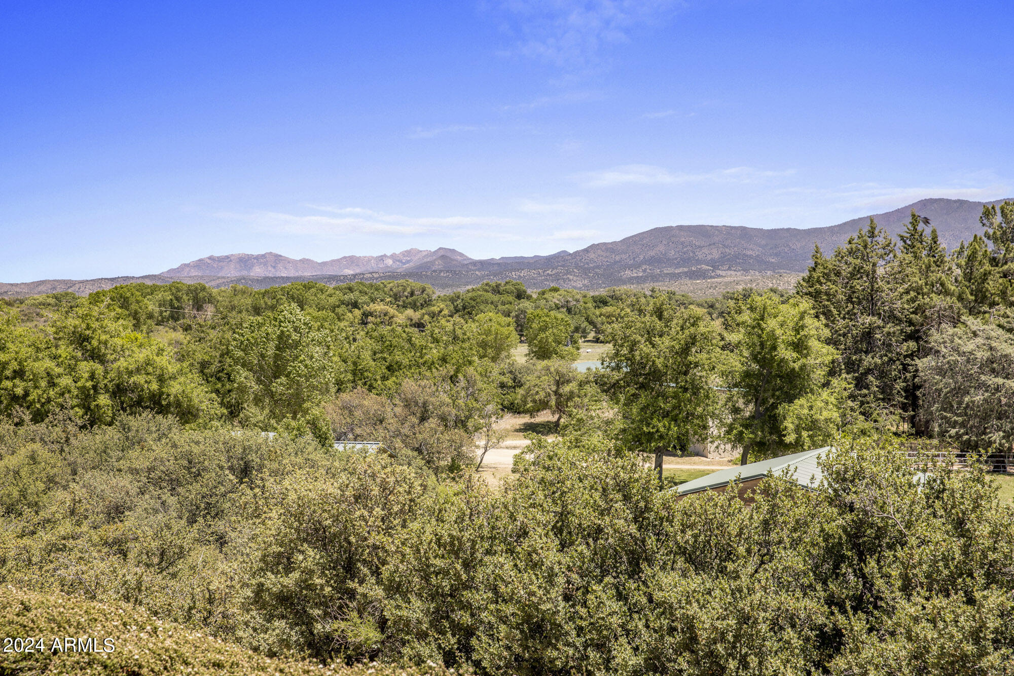 5500 Four Cross Ranch Road Skull Valley, AZ 86338 - Photo 56 of 59 a view of a city with a mountain