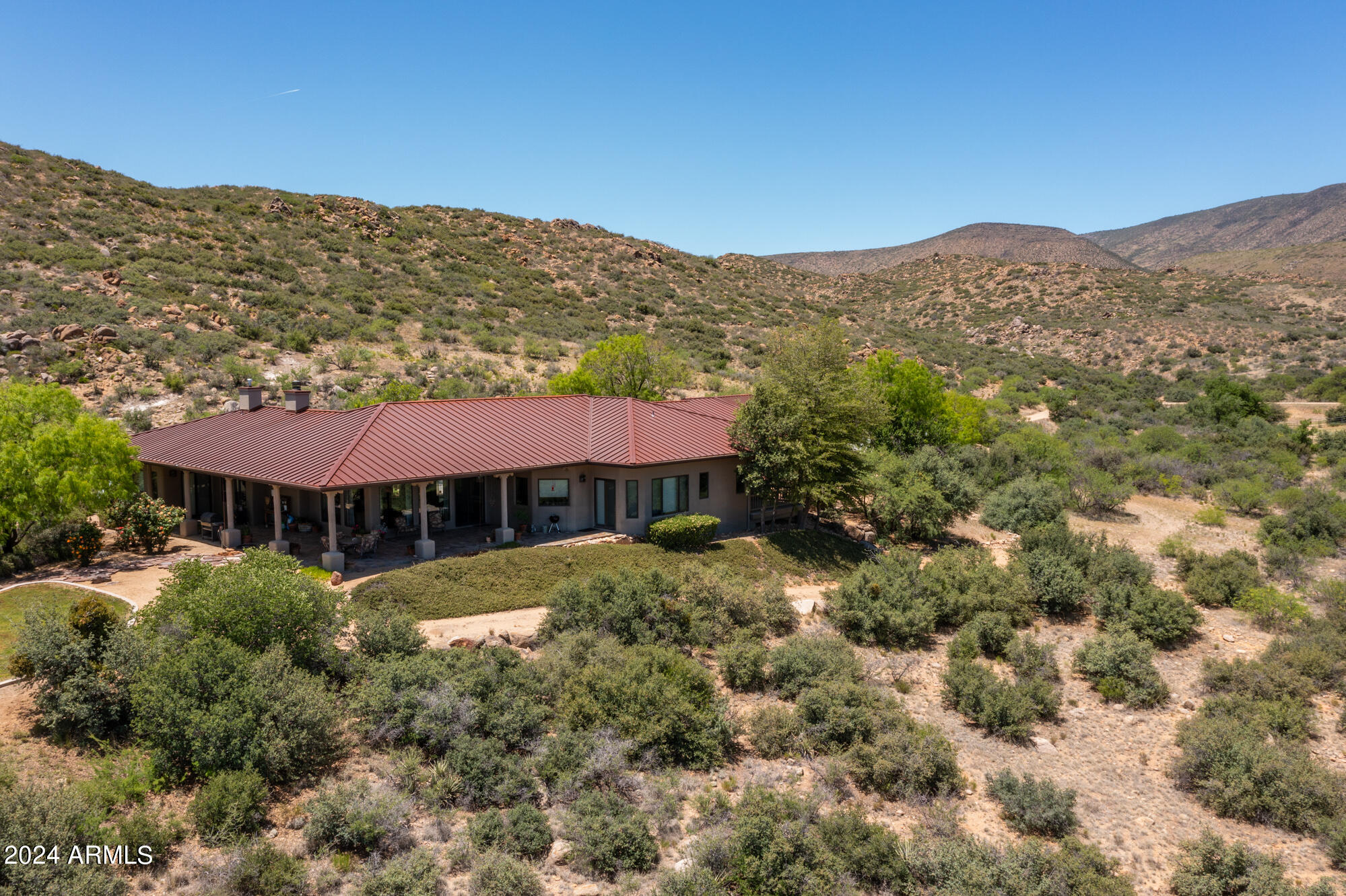 5500 Four Cross Ranch Road Skull Valley, AZ 86338 - Photo 59 of 59 a view of a house with a mountain yard