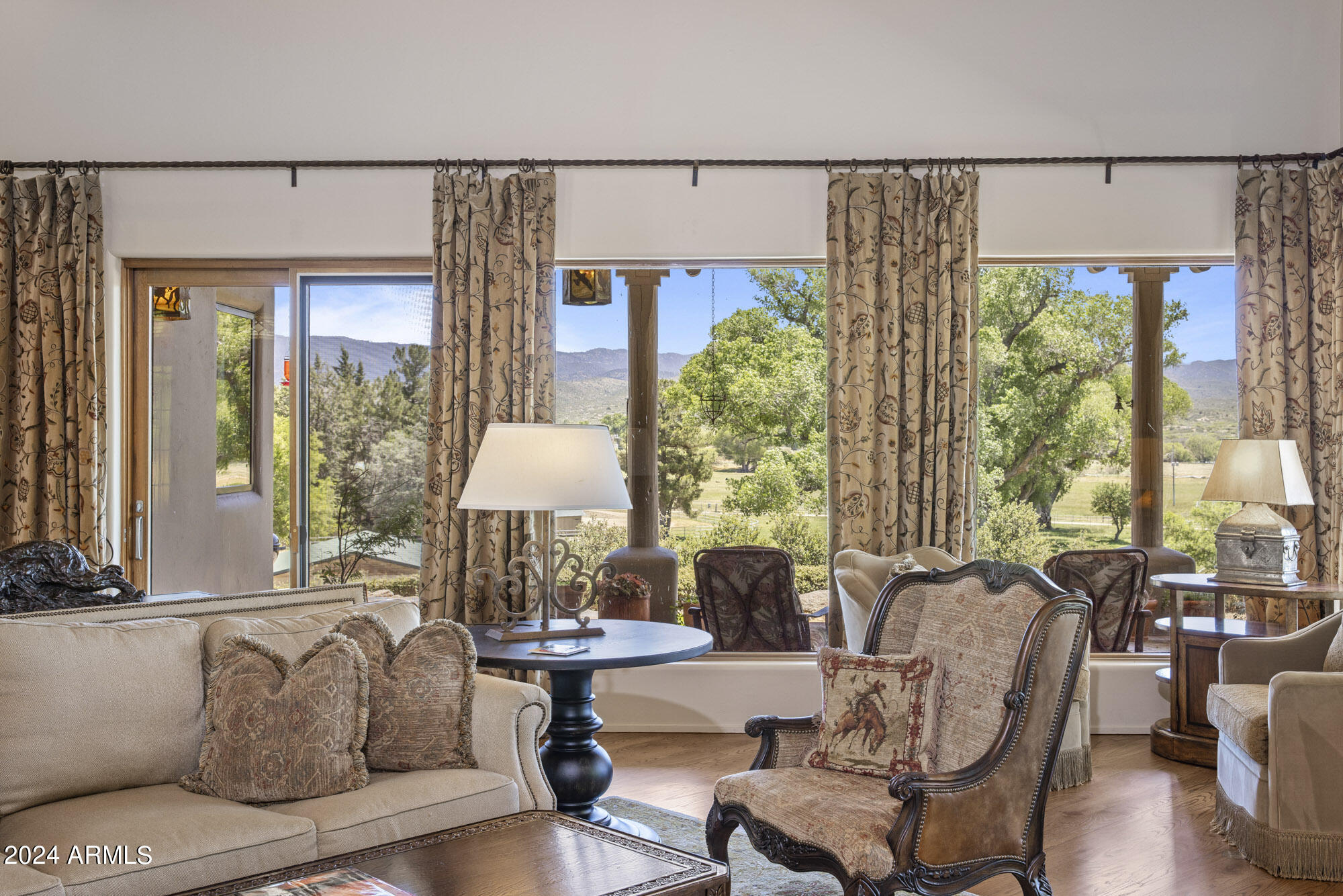 5500 Four Cross Ranch Road Skull Valley, AZ 86338 - Photo 10 of 59 a living room with furniture and a large window