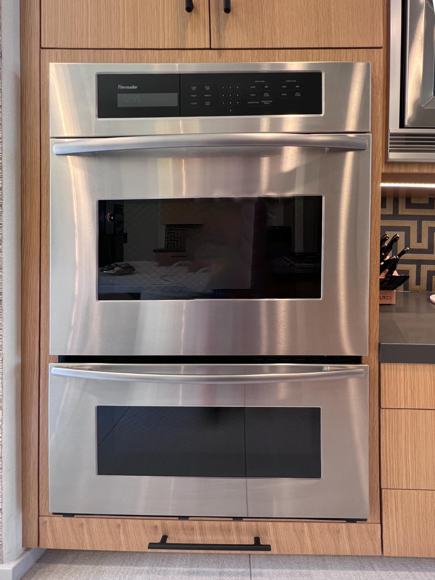 12 Varsity Circle Rancho Mirage, CA 92270 - Photo 15 of 59 a stove top oven sitting inside of a kitchen