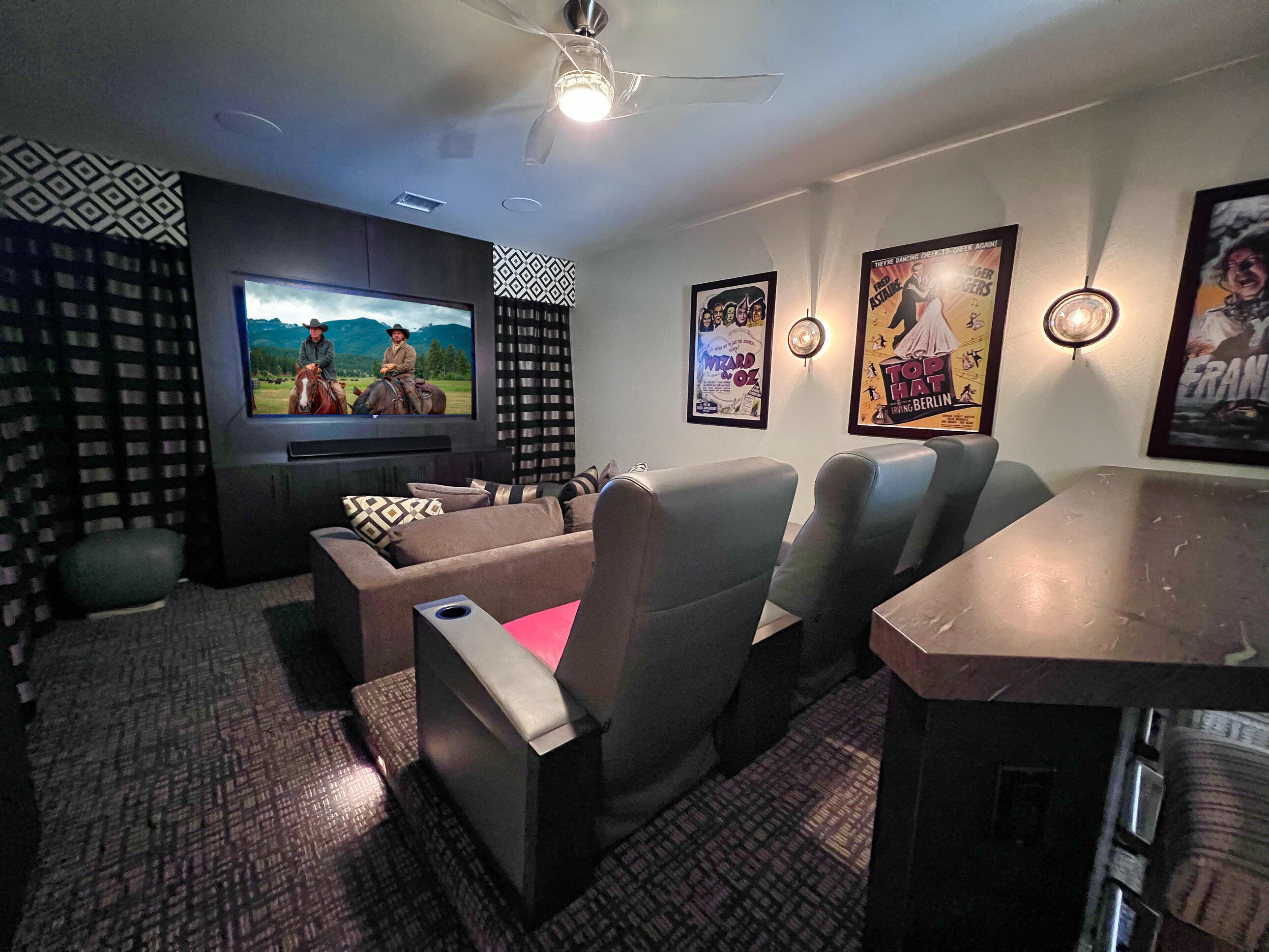 12 Varsity Circle Rancho Mirage, CA 92270 - Photo 17 of 59 a living room with furniture and a flat screen tv