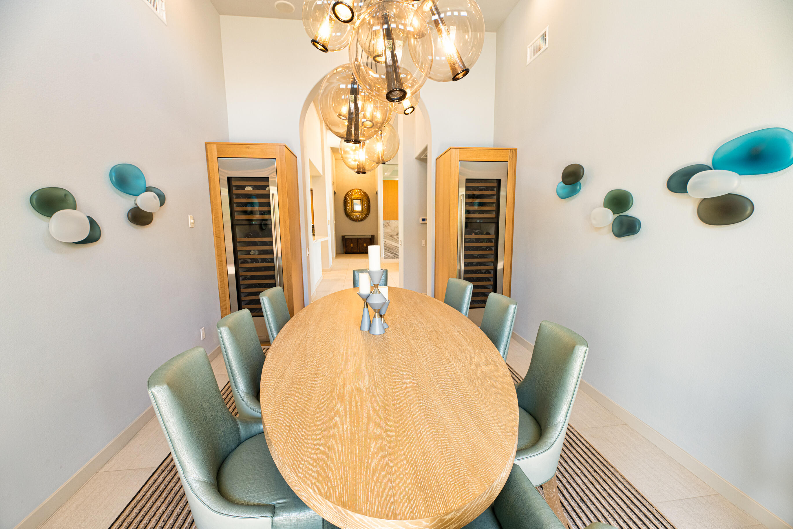 12 Varsity Circle Rancho Mirage, CA 92270 - Photo 20 of 59 a view of a dining room with furniture and wooden floor