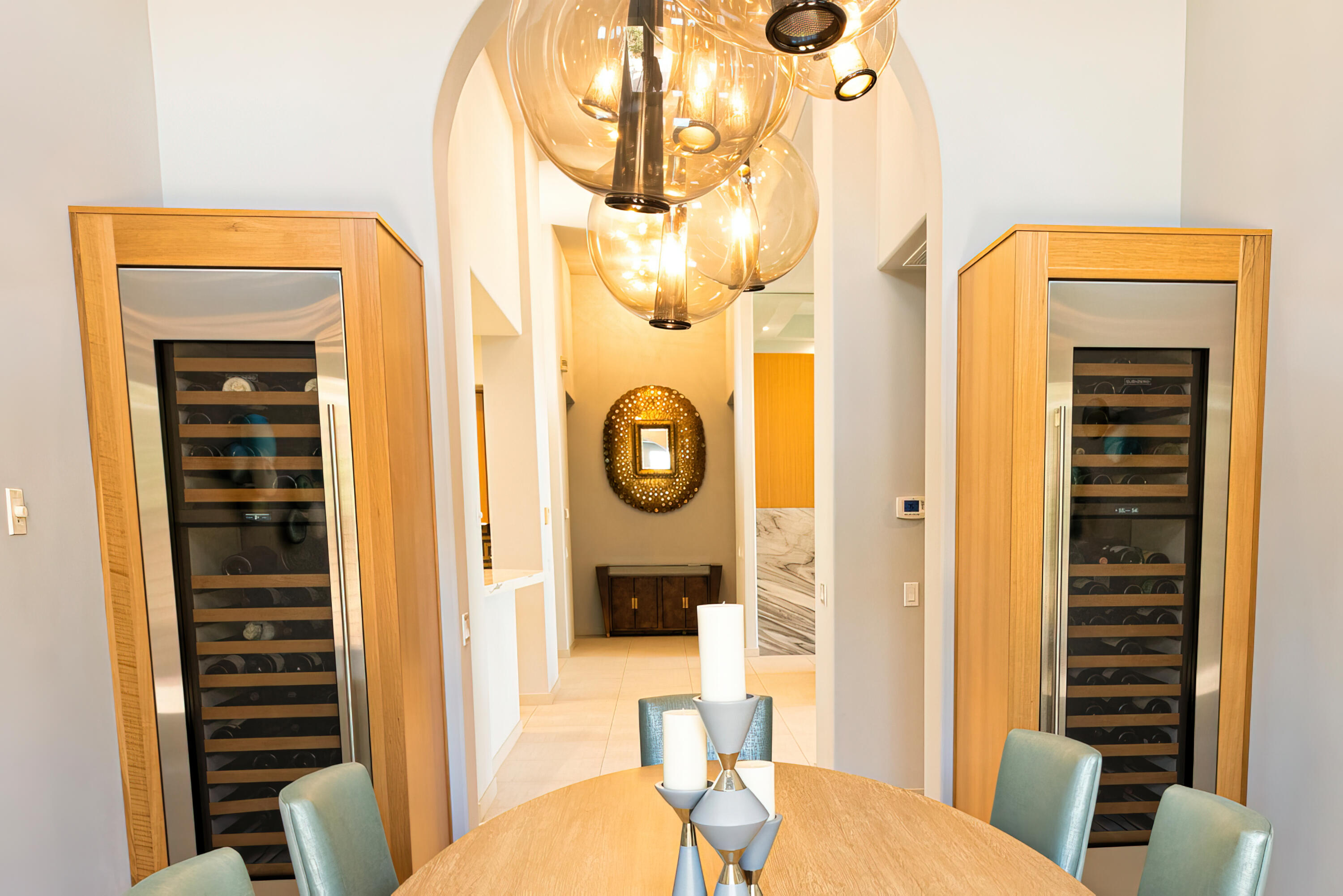 12 Varsity Circle Rancho Mirage, CA 92270 - Photo 21 of 59 a view of a hallway with furniture and wooden floor
