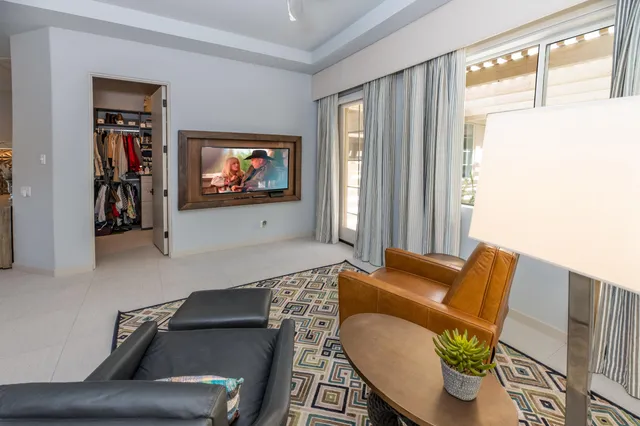 a spacious bathroom with a bathtub sink and toilet