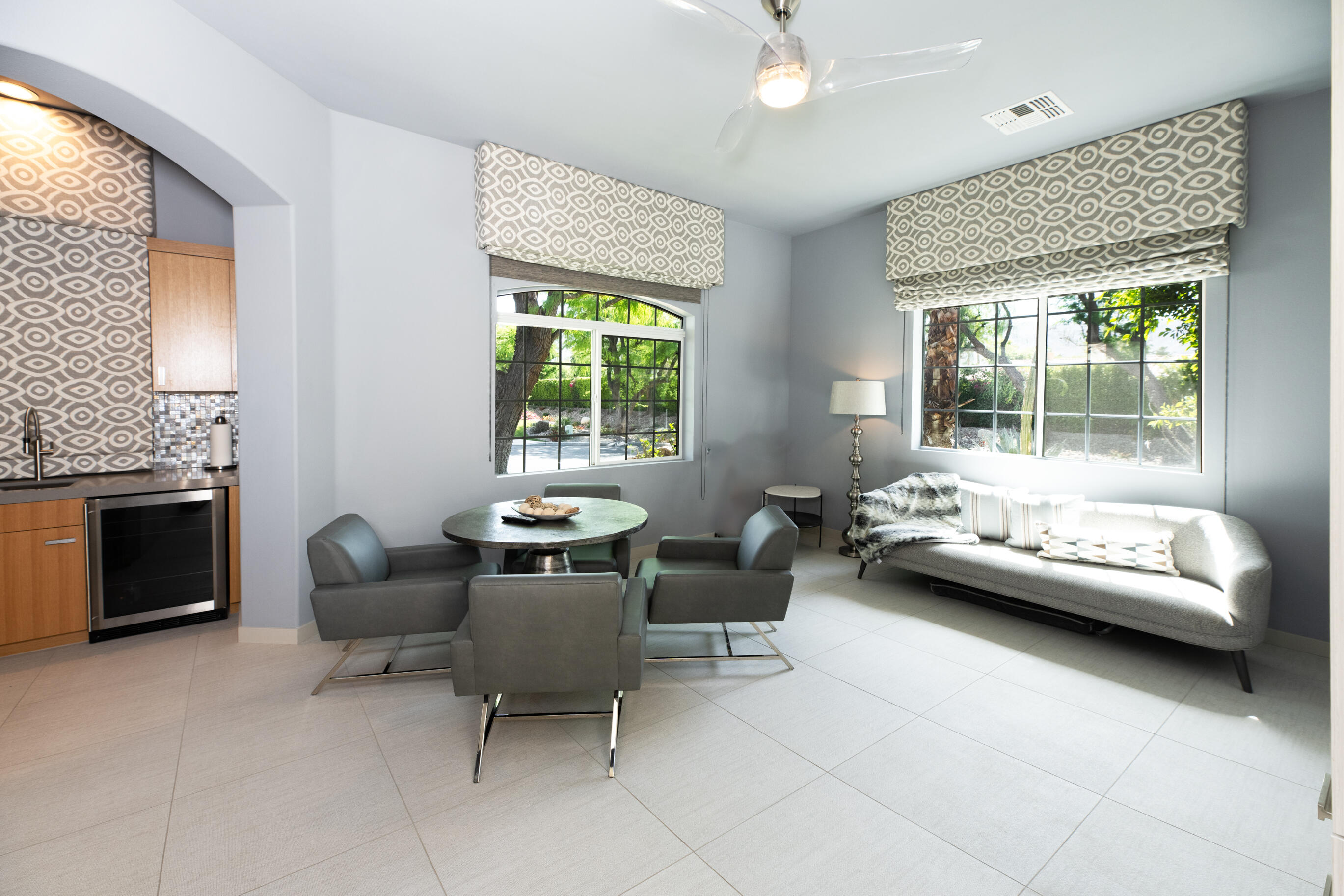 12 Varsity Circle Rancho Mirage, CA 92270 - Photo 36 of 59 a living room with furniture and a fireplace
