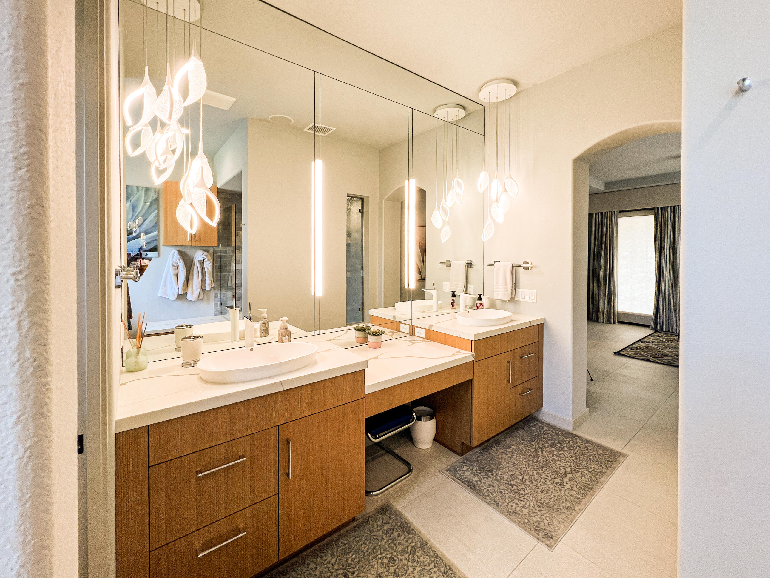 12 Varsity Circle Rancho Mirage, CA 92270 - Photo 49 of 59 a bathroom with a sink double vanity and a mirror