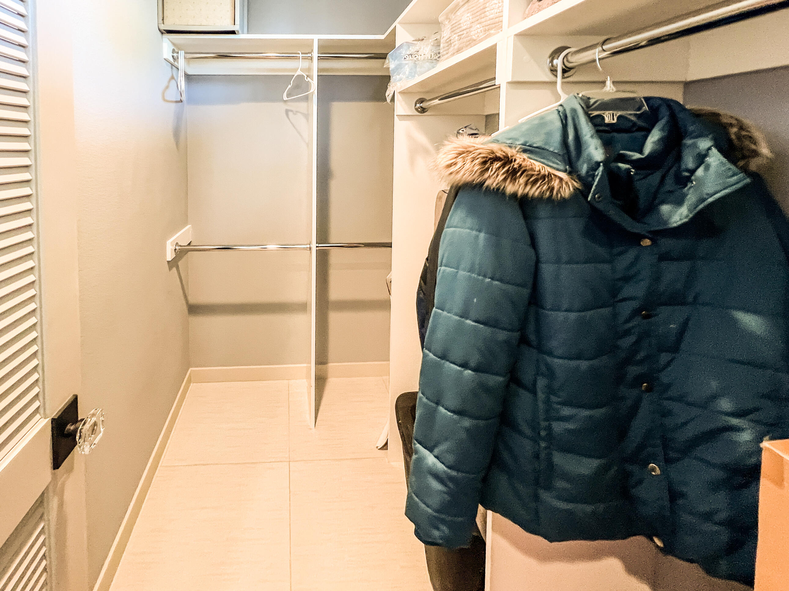 12 Varsity Circle Rancho Mirage, CA 92270 - Photo 54 of 59 a view of walk in closet with clothes and shoes
