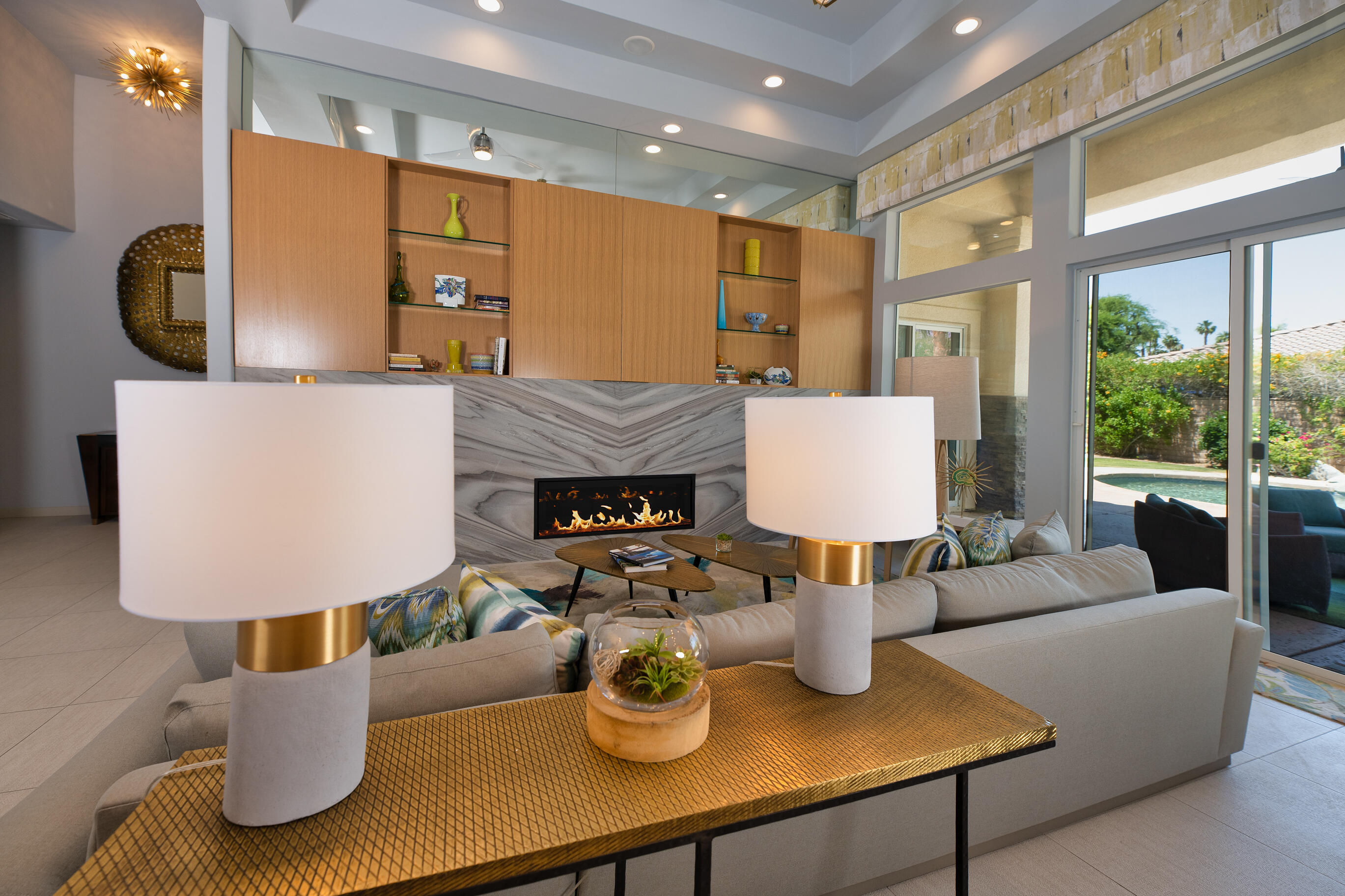 12 Varsity Circle Rancho Mirage, CA 92270 - Photo 8 of 59 a living room with furniture and a table