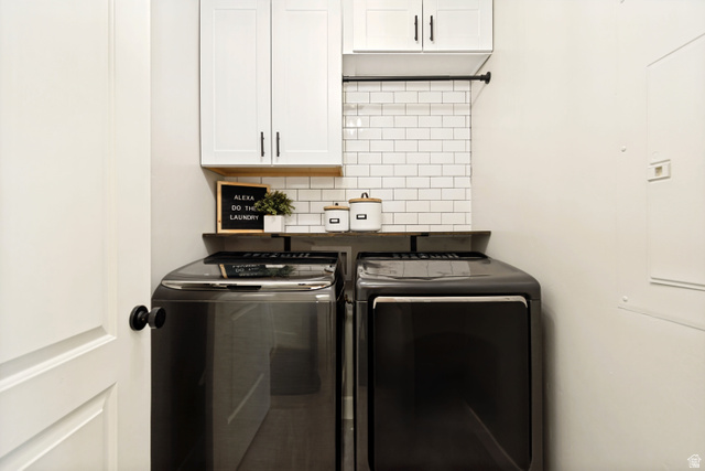 983 West 1550th Street South Springville, UT 84663 - Photo 21 of 43 Utility area featuring white subway tile backsplash, a dark wood-finish shelf, and white cabinetry with dark hardware.