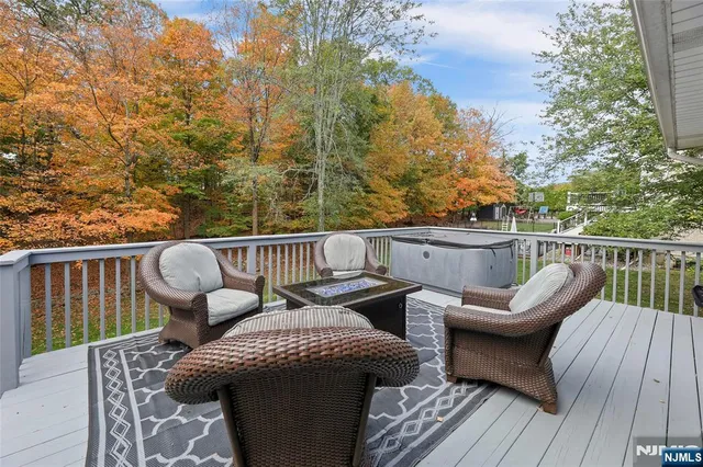 a view of a roof deck with couches