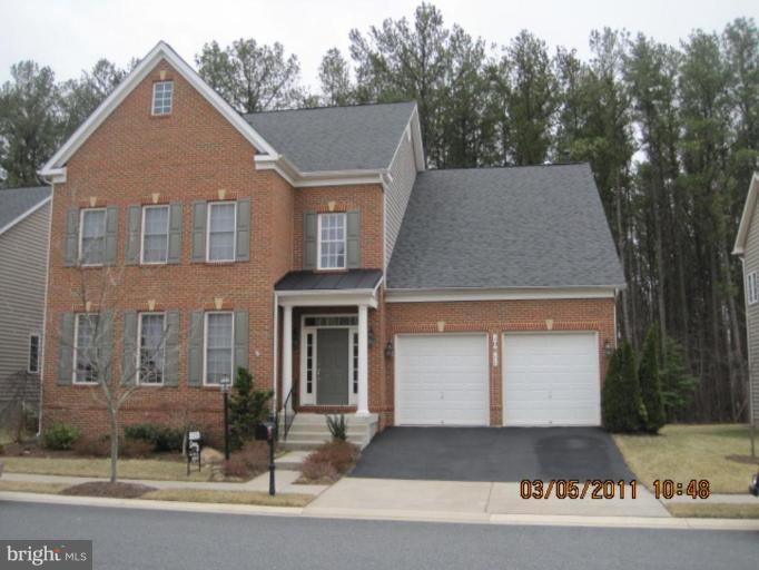 10811 Catron Road Perry Hall, MD 21128 - Photo 1 of 30 a front view of a house with a yard and garage