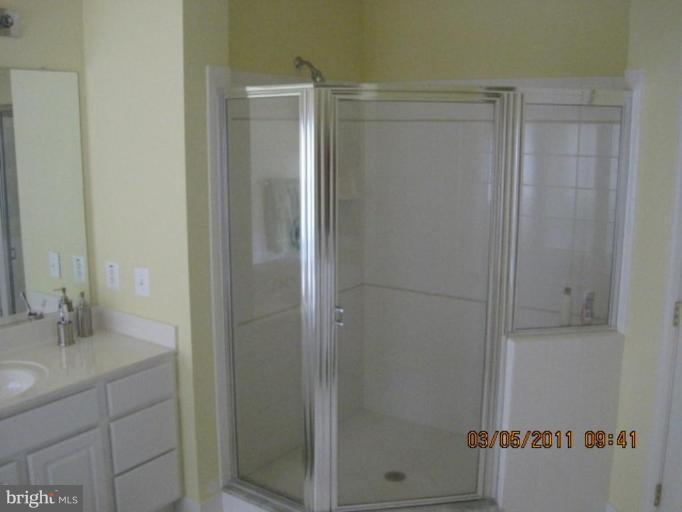 10811 Catron Road Perry Hall, MD 21128 - Photo 24 of 30 a bathroom with a shower and a sink