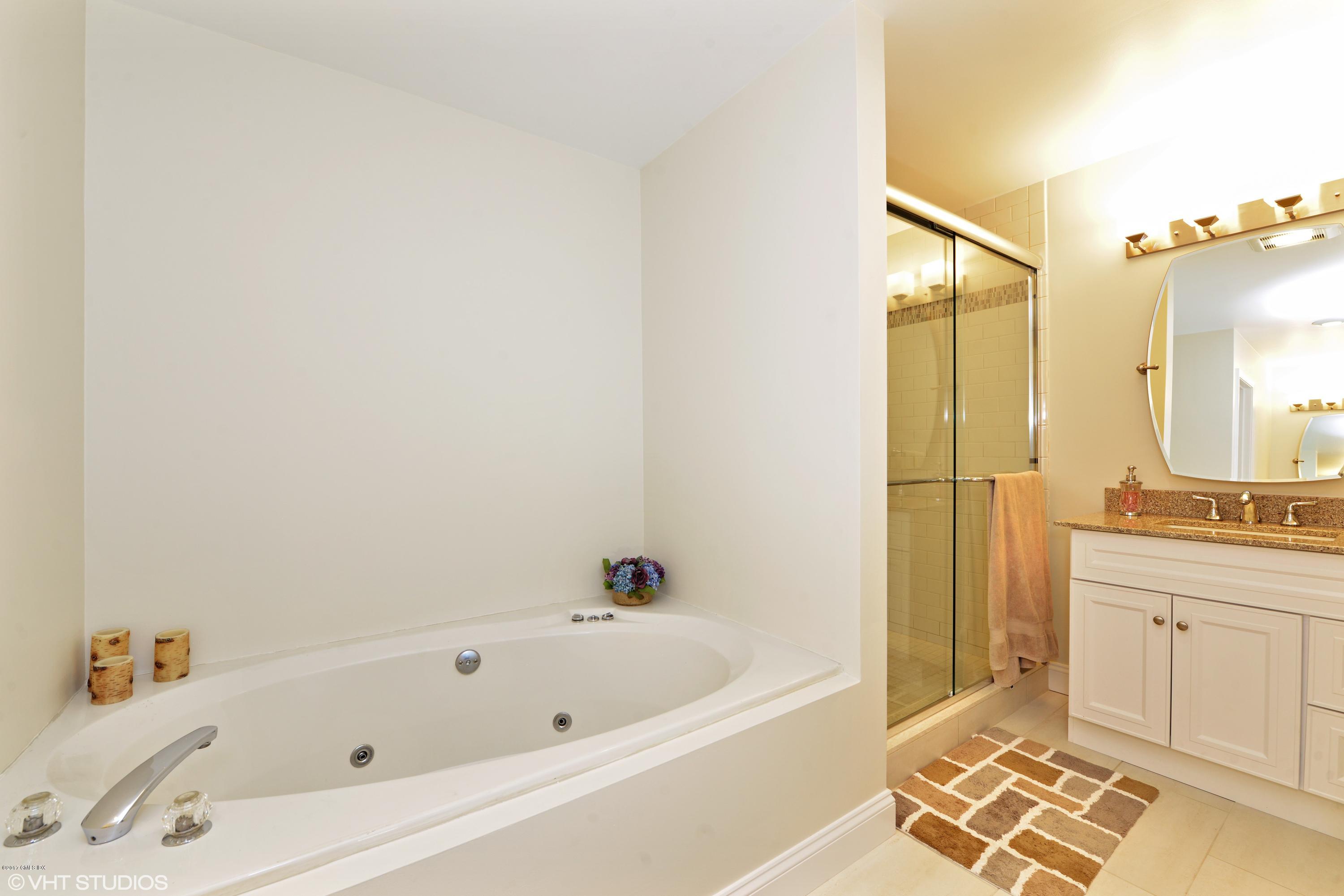 42 Ritch Avenue Greenwich, CT 06830 - Photo 20 of 32 a bathroom with a bathtub and a sink
