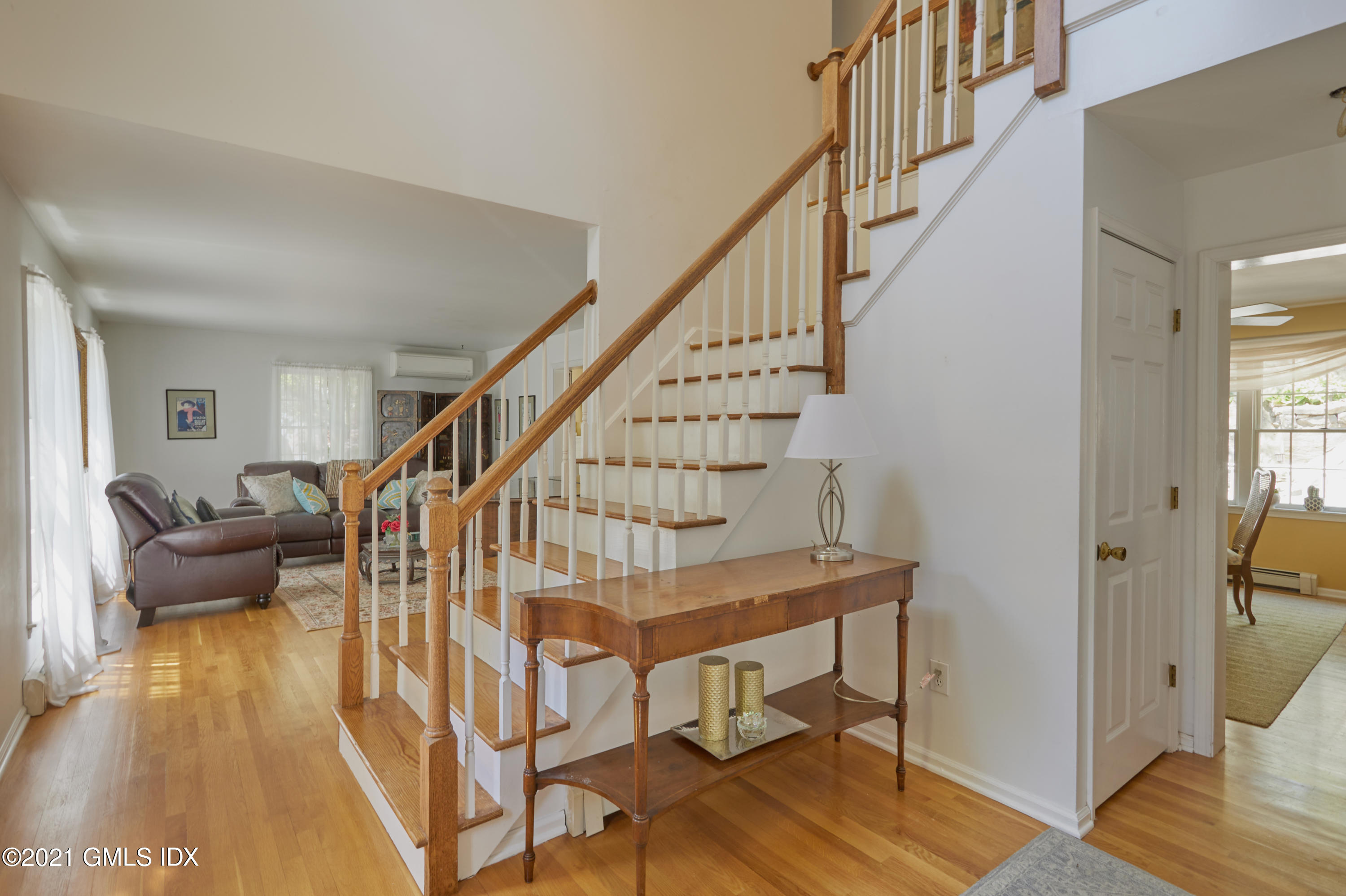 42 Ritch Avenue Greenwich, CT 06830 - Photo 5 of 32 a view of entryway livingroom and hall with wooden floor