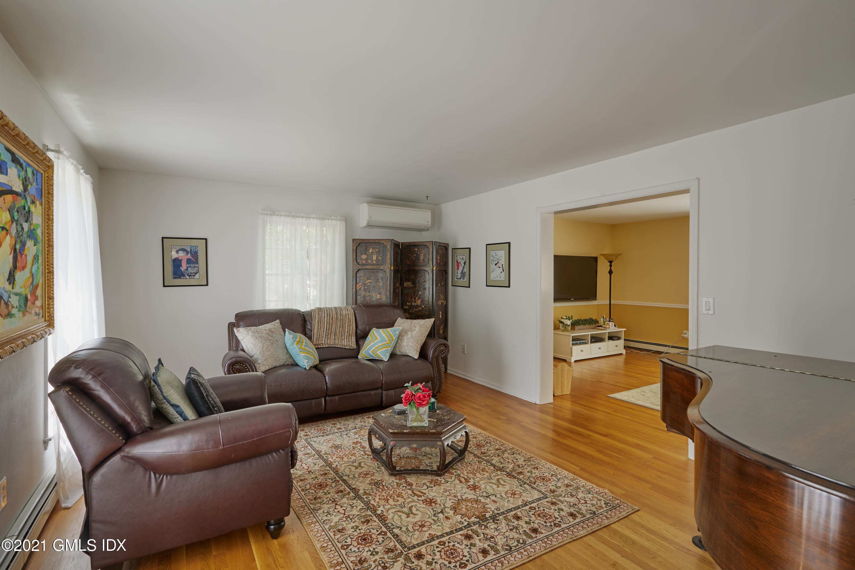 42 Ritch Avenue Greenwich, CT 06830 - Photo 6 of 32 a living room with furniture and a wooden floor