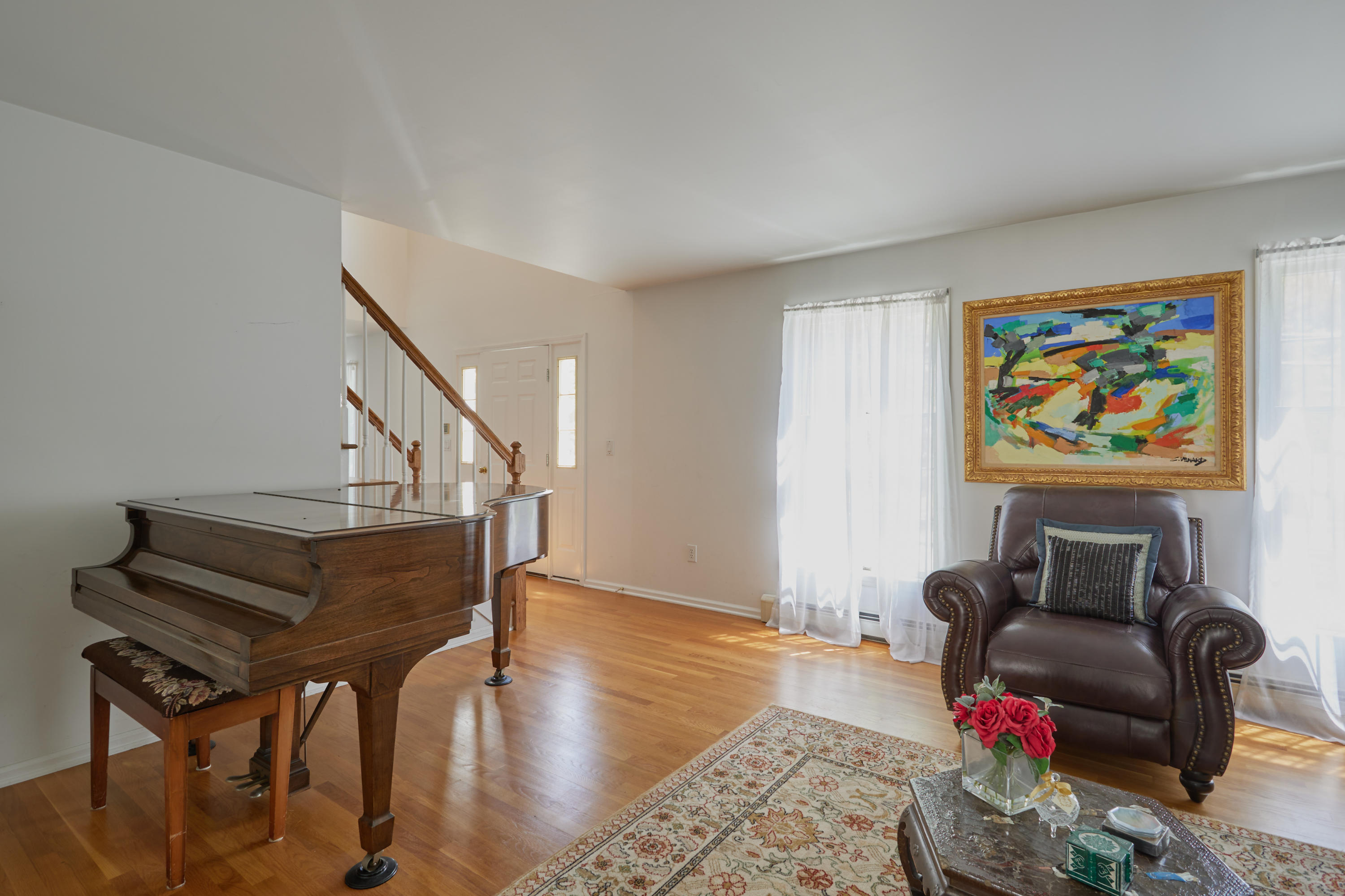 42 Ritch Avenue Greenwich, CT 06830 - Photo 8 of 32 a living room with furniture and wooden floor