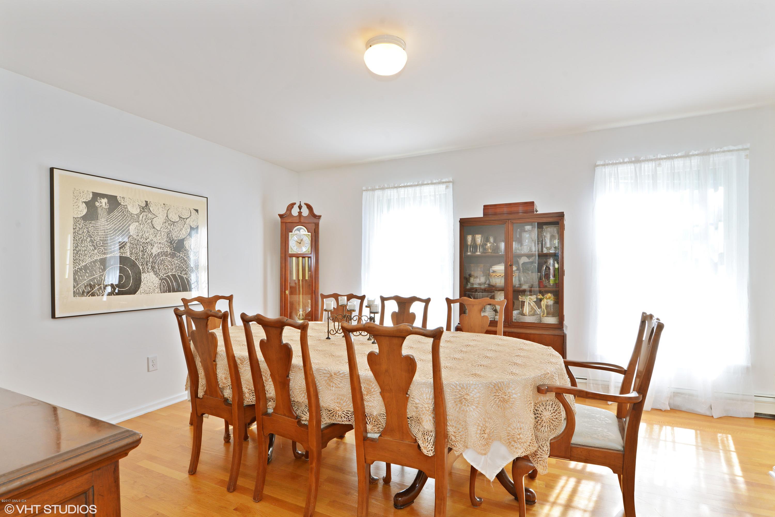 42 Ritch Avenue Greenwich, CT 06830 - Photo 9 of 32 a dining room with furniture and window