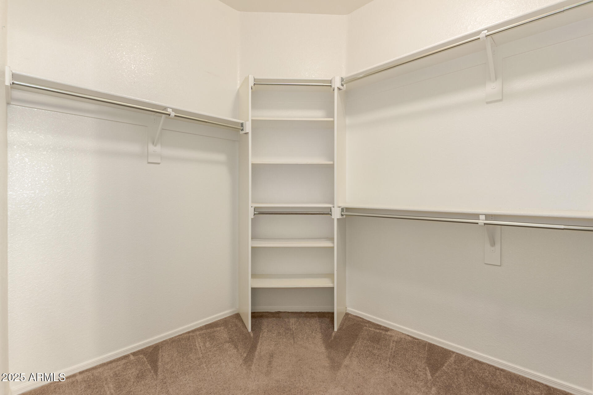 9724 East Tranquility Way Sun Lakes, AZ 85248 - Photo 14 of 46 27 Primary Walk-in Closet