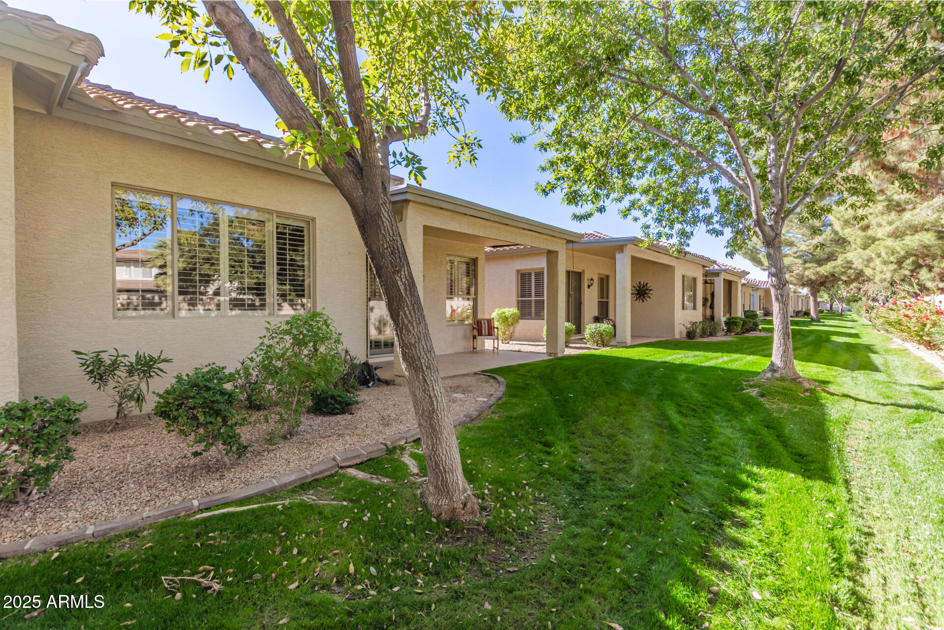 9724 East Tranquility Way Sun Lakes, AZ 85248 - Photo 23 of 46 32 HOA Maintained Backyard