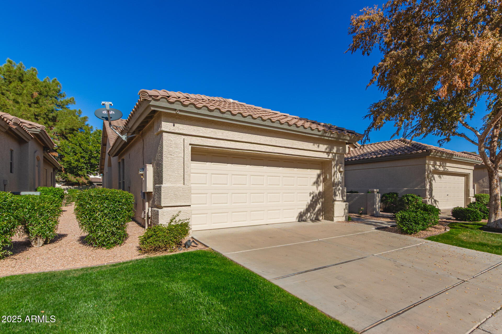 9724 East Tranquility Way Sun Lakes, AZ 85248 - Photo 3 of 46 03 2-Car Garage