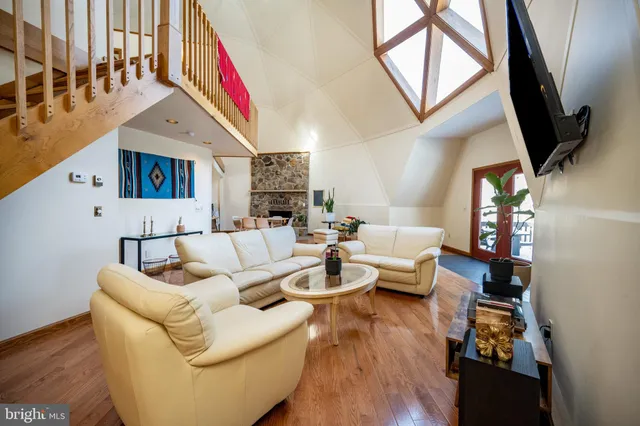 a view of a living room and bathroom
